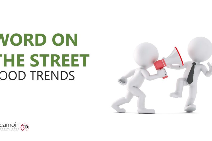 An illustration of one humanoid figure holding a megaphone to its mouth while another figure wearing a tie jumps back next to text reading 